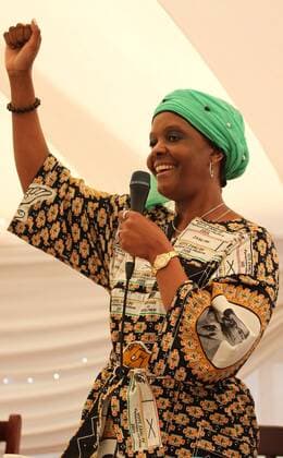 MAZOWE, Aug. 7, 2014 -- Zimbabwean First Lady Grace Mugabe speaks at a ruling party gathering in Mazowe, Zimbabwe, Aug. 7, 2014. Zimbabwean President Robert Mugabe s wife Grace Mugabe on Thursday warned critics that she is a force to be reckoned with as speculation went wild of her being air-lifted to the ruling party s top tier of bureaucracy, raising fears of a family dynasty looming. ) ZIMBABWE-POLITICS-FIRST LADY Stringer 