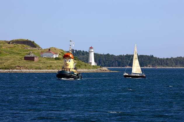 Theodore Tugboat in front of McNabs Island, Halifax Harbour, Nova scotia, Canada  acp45723