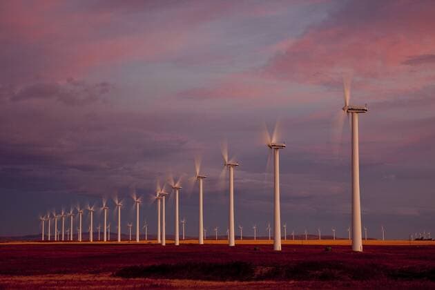 Power-generating windmills operating at dawn near Fort Macleod, southern Alberta, Canada.  acp62015 photography