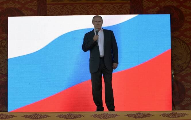 ITAR-TASS: KYZYL, RUSSIA. SEPTEMBER 6, 2014. Russia s president Vladimir Putin speaks at an event marking the 100th anniversary of the unification of Russia and Tyva Republic.  Aufmacher RE14E95F