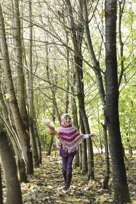 Germany, Vilsbiburg, Girl in forest, wearing poncho model released  STB000131