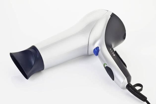 Hair dryer on white background  MAEF003218