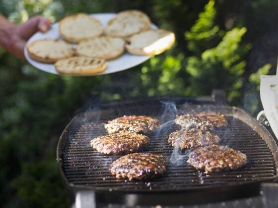 Food, Fast Food, Burger Germany, Munich, Mature man frying ground beef model released  SBHF000031