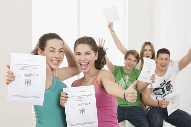 Young people with High School Diploma, smiling, portrait model released  WBF001419