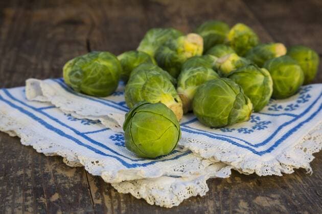 Brussels sprouts (Brassica oleracea var. gemmifera) on wooden table  LVF000325