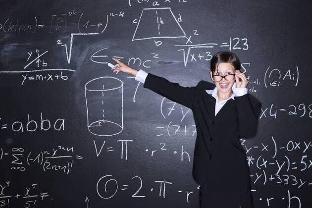 Portrait of girl holding chalk and solving problems model released  MAEF006908