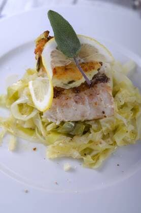 Nile perch on pointed cabbage, with risotto fritter on plate  ODF000603