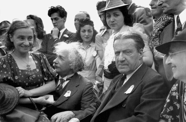 New York, New York: 1939 Albert Einstein with his daughter on his lap at the opening of the Jewish Pavillion at the World s Fair in Flushing Meadows in Queens. Grover Whalen is at his left. 990_16_X-Einstein-Albert_9HR