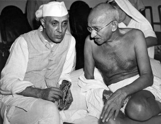 Bombay, India: July 15, 1946 jawaharlal Nehru, the newly elected President of the All India Congress, talking with Mahatma Gandhi, Indian political strong man, at a meeting of the Congress. 990_16_X-Gandhi-Mahatma_1HR