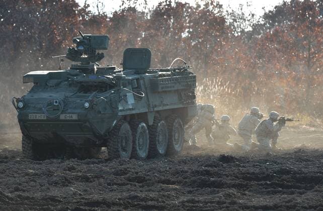U.S. Army s Stryker vehicle take part with Japan s Ground Self Defense Force in the joint military exercise Orient Shield 2014 at Hokkaido large training Area on October 30, 2014.  TKP2014103002