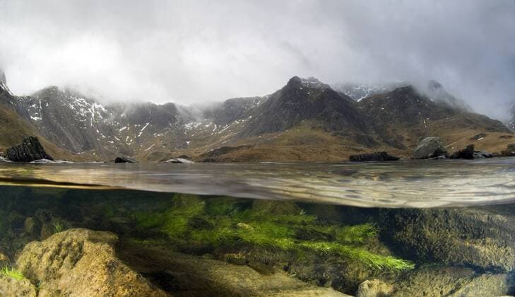 Split level image of Cwm Idwal and Llyn Idwal showing lake and mountain habitat and lacustrine algae, Snowdonia NP, North Wales, UK, January 2010. Winner of the Living Landscape: Connectivity category, British Wildlife Photography Awards, BWPA, competition 2011  1357188 GrahamxxEaton