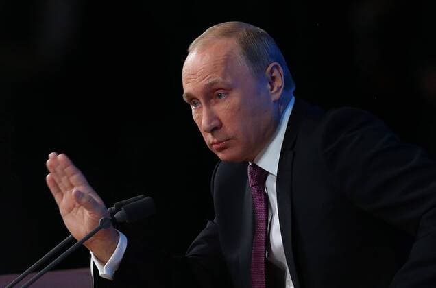 MOSCOW, RUSSIA. DECEMBER 18, 2014. Russia s president Vladimir Putin speaks at his annual press conference at Moscow s World Trade Centre. Sergei Fadeichev TASS  RE158083