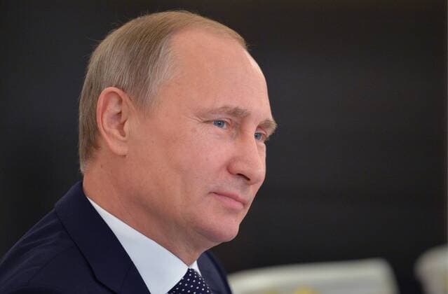 MOSCOW, RUSSIA. DECEMBER 24, 2014. Russia s President Vladimir Putin looks on at a joint session of the Russian State Council and the Presidential Council for Culture and Art on the implementation of the state cultural policy at the Moscow Kremlin. Alexei Druzhinin Russian presidential press service TASS  RE1589A1