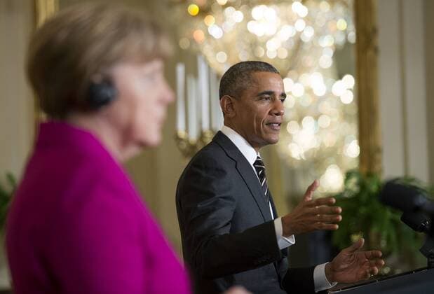 President Barack Obama (R) and German Chancellor Angela Merkel hold a joint press conference in the East Room at the White House in Washington, D.C. on February 9, 2015. Merkel and Obama spoke about Russian aggression in Ukraine.  WAP20150209307 KEVINxDIETSCH