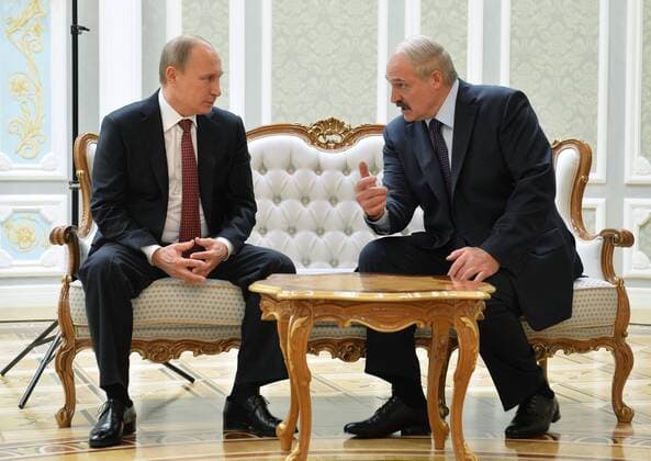 MINSK, BELARUS. FEBRUARY 11, 2015. Russia s president Vladimir Putin (L) and Belarus president Alexander Lukashenko at a meeting, at the Palace of Independence in Minsk, ahead of Normandy format Ukraine peace talks. Alexei Druzhinin Russian presidential press service TASS  RE15BA12