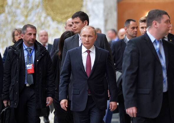 MINSK, BELARUS. FEBRUARY 11, 2015. Russia s president Vladimir Putin (C) seen ahead of a group photo ceremony during Normandy format Ukraine peace talks at the Palace of Independence in Minsk. Alexei Druzhinin Russian presidential press service TASS  RE15BA74