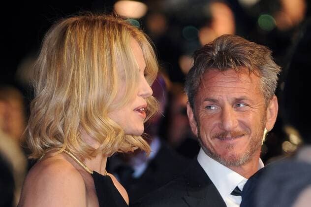 South African actress Charlize Theron and her boyfriend, American actor and director Sean Penn are pictured attending the World Premiere of The Gunman at BFI Southbank in London. FEBRUARY 16th 2015  PTYx15545