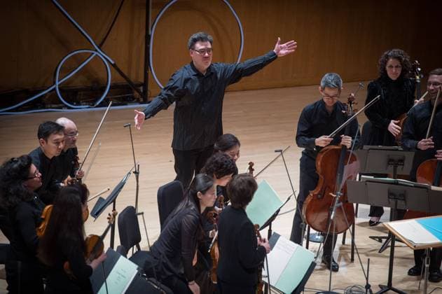 March 7, 2015 - Manhattan, New York, U.S. - ALAN GILBERT acknowledges the audience as he conducts the New York Philharmonic in an all-Nordic program, Grace Rainey Rodgers Auditorium, Metropolitan Museum of Art, Saturday, March 7, 2015. Manhattan U.S. - ZUMAb09_