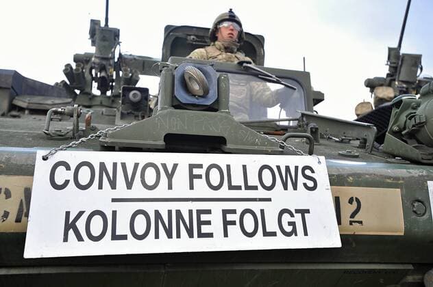 First armoured vehicle of U.S. military convoy crossed the Czech Republic border in Rozvadov-Waidhaus, west Bohemia, April 1, 2015. The troops continue to the Vilseck military base in Bavaria. Some 500 soldiers on around 115 armoured vehicles crossed the Czech Republic during the Dragoon Ride to demonstrate support for the allies territories that feel threatened by the Russian aggression in Ukraine. Soldiers return from an exercise within the Atlantic Resolve operation in the Baltics to their base in Germany, crossing six countries of Eastern and Central Europe, including the Czech Republic. (CTKxPhoto PavelxNemecek) CTKPhotoP201504010556401  nmc09