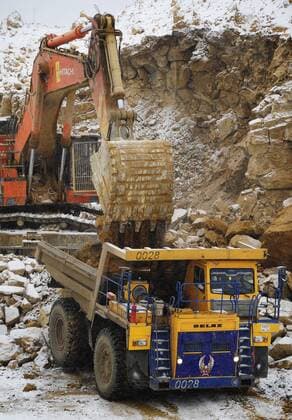 SAKHA, RUSSIA. APRIL 20, 2015. An excavator loading gold ore into a truck on the grounds of the Kuranakh gold field owned by AldanZoloto Mining Company. AldanZoloto is a subsidiary of Polyus Gold. Yuri Smityuk TASS  TS00093D
