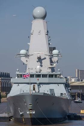 April 22, 2015 - Greenwich, London, UK - The Type-45 British destroyer HMS Defender arrived in London in the early hours of this morning for a six day visit. It s the first time that the Daring class vessel has visited London. She is in the capital to mark the centenary of the Battle of Gallipoli. She was seen glistening in the sunny spring weather today at her mooring in Greenwich. Hms Defender is 500ft long and will be leaving London next Tuesday. Credit : Rob Powell LNP Greenwich UK  - ZUMAl94_