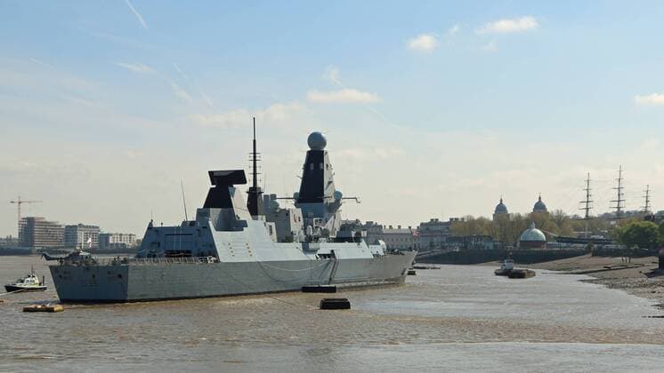 April 22, 2015 - Greenwich, London, UK - The Type-45 British destroyer HMS Defender arrived in London in the early hours of this morning for a six day visit. It s the first time that the Daring class vessel has visited London. She is in the capital to mark the centenary of the Battle of Gallipoli. She was seen glistening in the sunny spring weather today at her mooring in Greenwich. Hms Defender is 500ft long and will be leaving London next Tuesday. Credit : Rob Powell LNP Greenwich UK  - ZUMAl94_