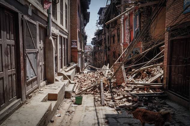 April 27, 2015 - Kathmandu, Nepal - A massively destroyed building in Kathmandu on April 27, 2015. The death toll from the 7.8-magnitude earthquake at the weekend in Nepal was 3,726, the Interior Ministry said 27 April, after thousands more spent a second night in the open. The government said around 6,500 people were injured in the quake that hit on Saturday. Besides the fear caused by numerous aftershocks, people camping in open spaces were suffering a combination of rain, hunger and thirst. Kathmandu Nepal  - ZUMAn230