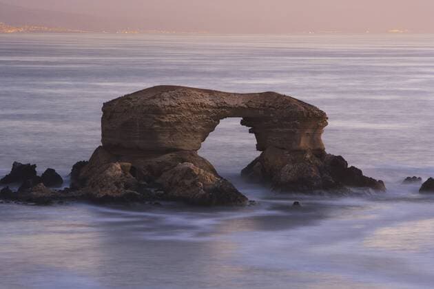 The natural arch monument La Portada on a volcanic base, Chile  JamixTarris (25882)