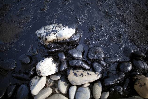 May 19, 2015 - Goleta, California, U.S - Oil is seen covering the shoreline after an oil spill occurred near Refugio State Beach located north of Santa Barbara Tuesday afternoon. An estimated 21,000 gallons of crude oil dumped into the ocean from a broken pipeline. Goleta U.S. - ZUMAh129