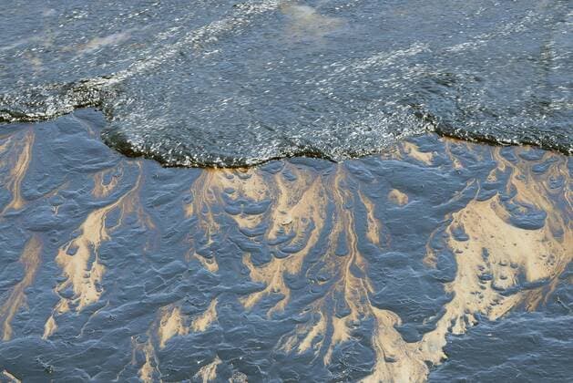 May 19, 2015 - Gaviota, California, U.S. - Oil washes ashore along the Gaviota coastline. The spill, estimated by the Coast Guard to be 21 thousand gallons, began with a ruptured 24 inch line that spilled into a culvert and through a drainage pipe onto the beach below. Gaviota U.S. - ZUMAe60_