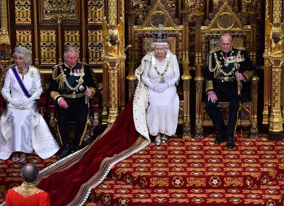 May 27, 2015 - London, GREAT BRITAIN - Britain s Queen Elizabeth II, 2nd right, seated on the throne in the House of Lords next to her husband, Prince Philip, Duke of Edinburgh, right, son, Prince Charles, Prince of Wales, 2nd left and his wife Camilla, Duchess of Cornwall, prepares to deliver the Queen s Speech during the State Opening of Parliament at the Palace of Westminster in London Wednesday, May 27, 2015. The State Opening of Parliament marks the formal start of the parliamentary year and the Queen s Speech sets out the governmentÃ¢â‚¬â ¢s agenda for the coming session. London GREAT BRITAIN - ZUMAp124