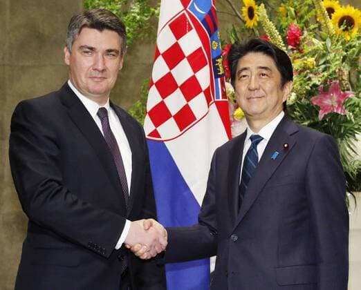 PM Abe meets with Croatian counterpart Japanese Prime Minister Shinzo Abe (R) shakes hands with Croatian Prime Minister Zoran Milanovic prior to their official meeting in Tokyo on June 17, 2015. Japan hopes to strengthen economic ties with Croatia and the European Union, of which Croatia is the most recent member. 