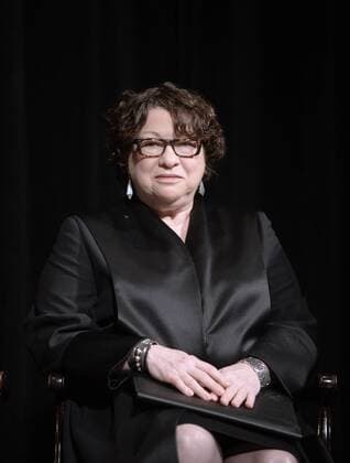 U.S. Supreme Court Justice Sonia Sotomayor looks on before administering the oath of office for Loretta Lynch, the 83rd attorney general, during a formal investiture ceremony at the Warner Theatre on June 17, 2015 in Washington, DC. Lynch was officially sworn in by Vice President Joe Biden as the 83rd Attorney General of the United States on April 27, 2015. Pool  WAX20150617129 OLIVIERxDOULIERY