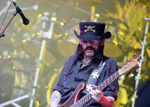 English rock musician Lemmy Kilmister of Motorhead is pictured performing live on stage during the second day of the Glastonbury Festival at Worthy Farm, Pilton in England. JUNE 27th 2015  PTYx152032
