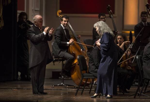 BUENOS AIRES, July 29, 2015 -- Argentinean pianist Martha Argerich (R) responds to the applause from Daniel Barenboim (L), Argentinean Musician and orchestra conductor, during a concert held with the West-Eastern Divan Orchestra at the Colon Theater, in Buenos Aires, capital of Argentina, July 29, 2015. ) (jp) ARGENTINA-BUENOS AIRES-MUSIC-CONCERT MARTINxZABALA 