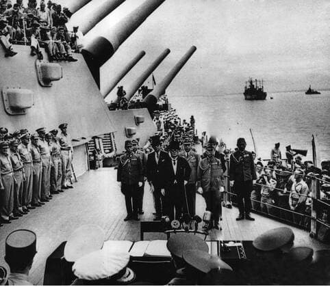 File photo taken on Sept. 2, 1945 shows Japan s surrender ceremony aboard the United States Navy battleship USS Missouri anchored in Tokyo Bay. On Aug. 15, 1945, Japanese Emperor Hirohito delivered a recorded radio address to the nation, announcing the surrender of Japan in World War II, one day after Japan declared its acceptance of the provisions of the Potsdam Proclamation jointly issued by China, the United States and Britain on July 26, 1945, with the Soviet Union joining later. The proclamation, which radicated Japan s crimes of aggressions during WWII and determined the principles under which Japan is required to behave after the war, is an important document for laying the foundation for the post-war world order and safeguarding peace in Asia and the rest of the world. More than 35 million Chinese were killed or injured in the war of r