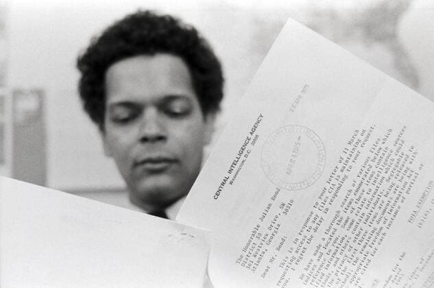 April 25, 1975 - Atlanta, Georgia, USA - Julian Bond, 75, a founder of SNCC - The Student Non-Violent Coordinating Committee and later Chairman of the NAACP - reviews a response letter to his Freedom of Information (FOI) request from the Central Intelligence Agency (CIA) in April of 1975. Bond, a civil rights and anti VietNam war activist suspected that he and others in the movements were the victims of targeted US government surveillance. An elected Georgia state legislator, Bond was unhappy with the government s scant response. Atlanta USA - ZUMAkh1_