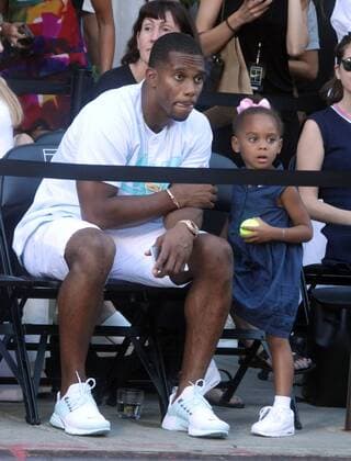 Aug. 24, 2015 - New York, New York, U.S. - VICTOR CRUZ and his daughter attend the NYC Street Tennis event in the Meatpacking District. New York U.S. - ZUMAk03_