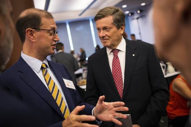 Sept. 1, 2015 - Toronto, ON, Canada - Toronto, Canada - September, 1 2015 - Mayor John Tory has a conversation with Mark Wiseman (left), President and CEO of the CPP Investment Board, and United Way s 2015 Campaign Chair, before the United Way Toronto & York Region 2015 Fundraising Campaign Launch at the Canadian National Institute for the Blind. Toronto Canada  - ZUMAt14_