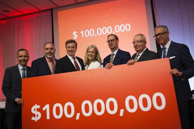 Sept. 1, 2015 - Toronto, ON, Canada - Toronto, Canada - September, 1 2015 - Susan McIsaac (centre), President and CEO of United Way Toronto & York Region, stands next to Mayor John Tory (centre left) and Mark Wiseman (centre right), President and CEO of the CPP Investment Board, after the United Way campaign launch, which announced its goal of raising $100 million for the charity s first-ever region-wide fundraising campaign. Toronto Canada - ZUMAt14_