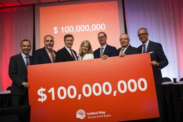 Sept. 1, 2015 - Toronto, ON, Canada - Toronto, Canada - September, 1 2015 - Susan McIsaac (centre), President and CEO of United Way Toronto & York Region, stands next to Mayor John Tory (centre left) and Mark Wiseman (centre right), President and CEO of the CPP Investment Board, after the United Way campaign launch, which announced its goal of raising $100 million for the charity s first-ever region-wide fundraising campaign. Toronto Canada - ZUMAt14_