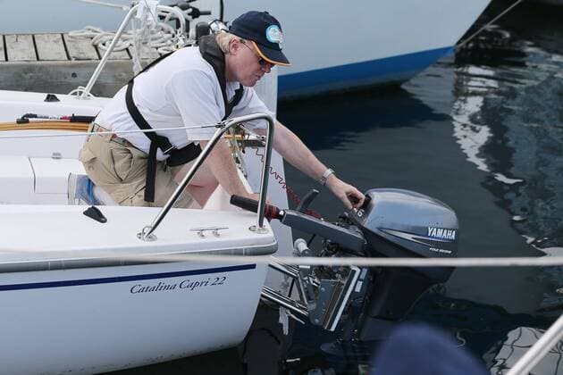 Sept. 3, 2015 - Toronto, ON, Canada - TORONTO, ON- SEPTEMBER 3 - David Brown gets ready to start an outboard to clear the marina as he readies the boat for a training sail in Humber Bay. David Brown is a blind sailor from Toronto who nest week will compete at the world championships in Chicago. He competes with another blind sailor Brian Arthur and with the help of two others who will guide them. in Toronto Harbour in Toronto. September 3, 2015. Toronto Canada  - ZUMAt14_