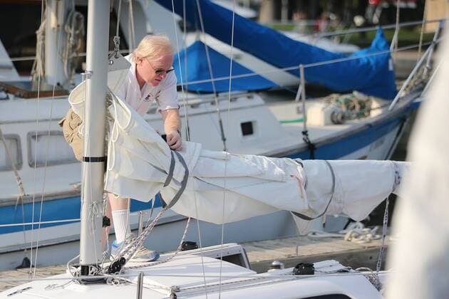 Sept. 3, 2015 - Toronto, ON, Canada - TORONTO, ON- SEPTEMBER 3 - David Brown helps ready the boat for a training sail in Humber Bay. David Brown is a blind sailor from Toronto who nest week will compete at the world championships in Chicago. He competes with another blind sailor Brian Arthur and with the help of two others who will guide them. in Toronto Harbour in Toronto. September 3, 2015. Toronto Canada  - ZUMAt14_