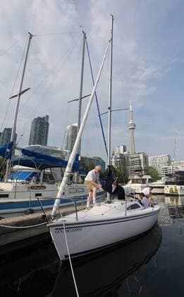 Sept. 3, 2015 - Toronto, ON, Canada - TORONTO, ON- SEPTEMBER 3 - David Brown helps ready the boat for a training sail in Humber Bay. David Brown is a blind sailor from Toronto who nest week will compete at the world championships in Chicago. He competes with another blind sailor Brian Arthur and with the help of two others who will guide them. in Toronto Harbour in Toronto. September 3, 2015. Toronto Canada  - ZUMAt14_