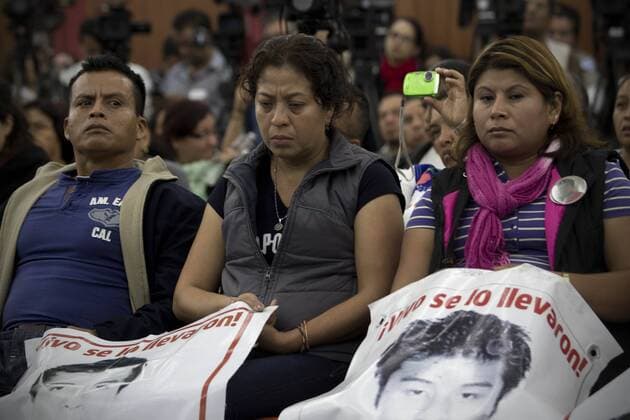 (150906) -- MEXICO CITY, Sept. 6, 2015 -- Family members of the 43 students of the Rural Teacher s College Raul Isidro Burgos of Ayotzinapa, Guerrero, that went missing in September 2014 attend the presentation of the report of the Inter-American Commission on Human Right (IACHR) on the case of the missing students in Mexico City, capital of Mexico, on Sept. 6, 2015. According to local press, the IACHR probe concluded on Sunday that the missing students were not incinerated in a landfill. Alejandro Ayala) (vf) MEXICO-MEXICO CITY-IACHR-SOCIETY-REPORT e AlejandroxAyala 