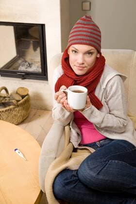 Woman being ill, treating herself at home.  1272339