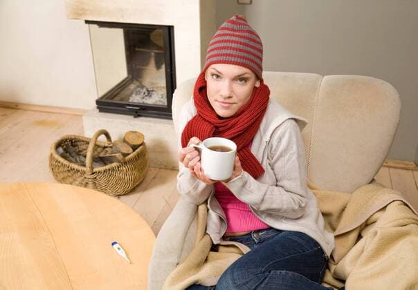 Woman being ill, treating herself at home.  1272340