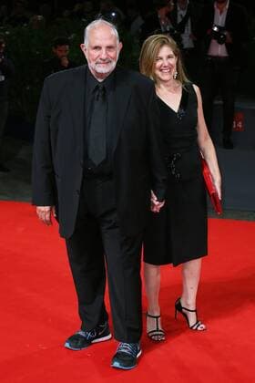VENICE, ITALY - SEPTEMBER 09: Brian De Palma and guest attend the Premio Jaeger-LeCoultre Glory to the Filmmaker Red Carpet during 72nd Venice Film Festival at Palazzo Del Cinema on September 9, 2015 in Venice, Italy. markxcape