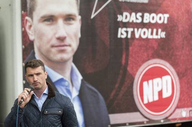 Sept. 9, 2015 - Berlin, GERMANY - The NPD party chairman Frank Franz ( NPD ) maintains while before the NPD demo LaGeSo on 09 09 2015 in Berlin , Germany a speech . Prior to the State Office of Health and Welfare s Rights Party NPD demonstrated with circa 8 participants under the slogan the boat is full . About 200 counter-demonstrators , the demonstration and supporters presented contrary. Berlin GERMANY  - ZUMAn230