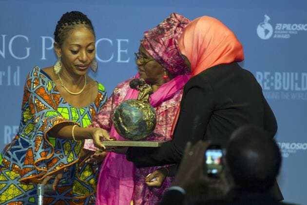 Milano, 11.09.2015 - Building the Peace Award - Samia Nkrumah presidente del partito ghanese Convention PeopleâÄ™s Party premia Hawa Abdi Dhiblawe (Mama Hawa), gynecologist who created a hospital where care all without distinction of clans in Somalia  0
